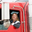 smiling female truck driver